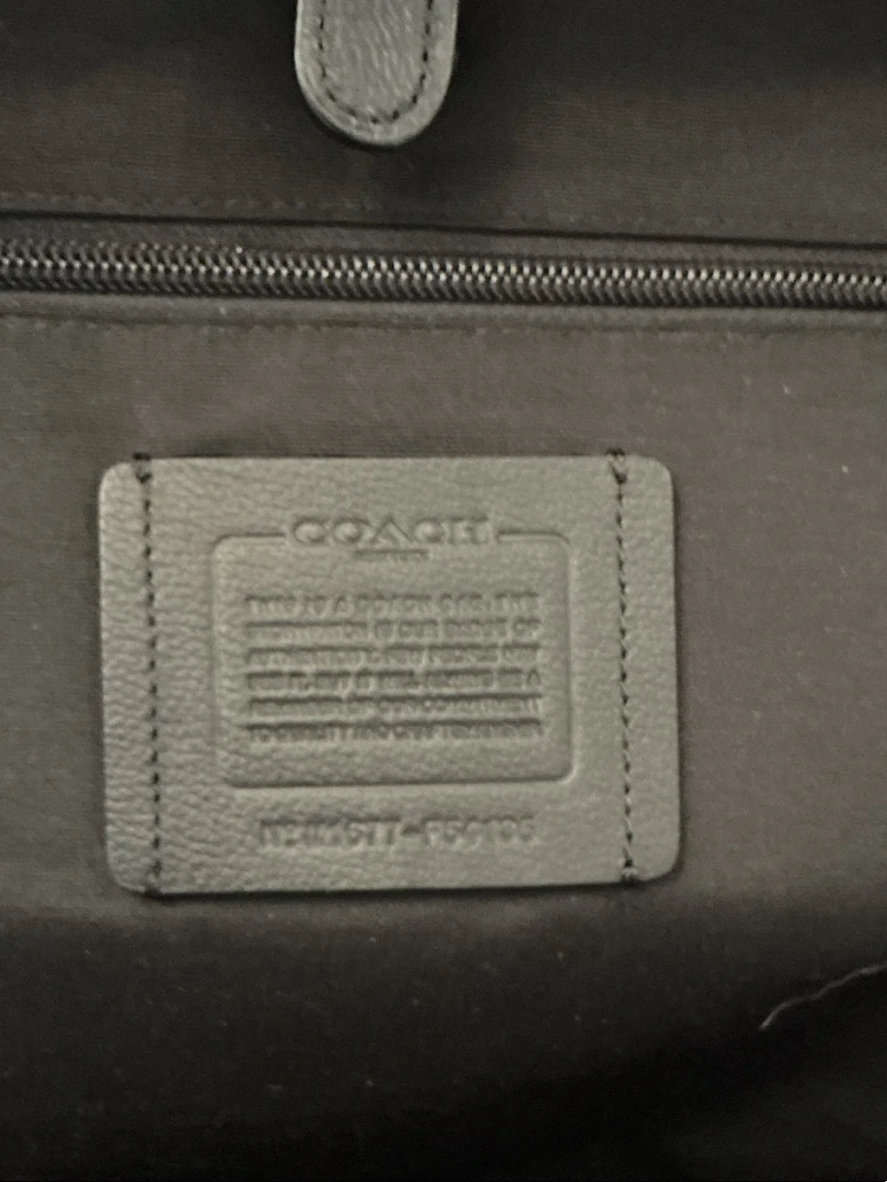 Coach Black Leather Sling Backpack with Front Pocket